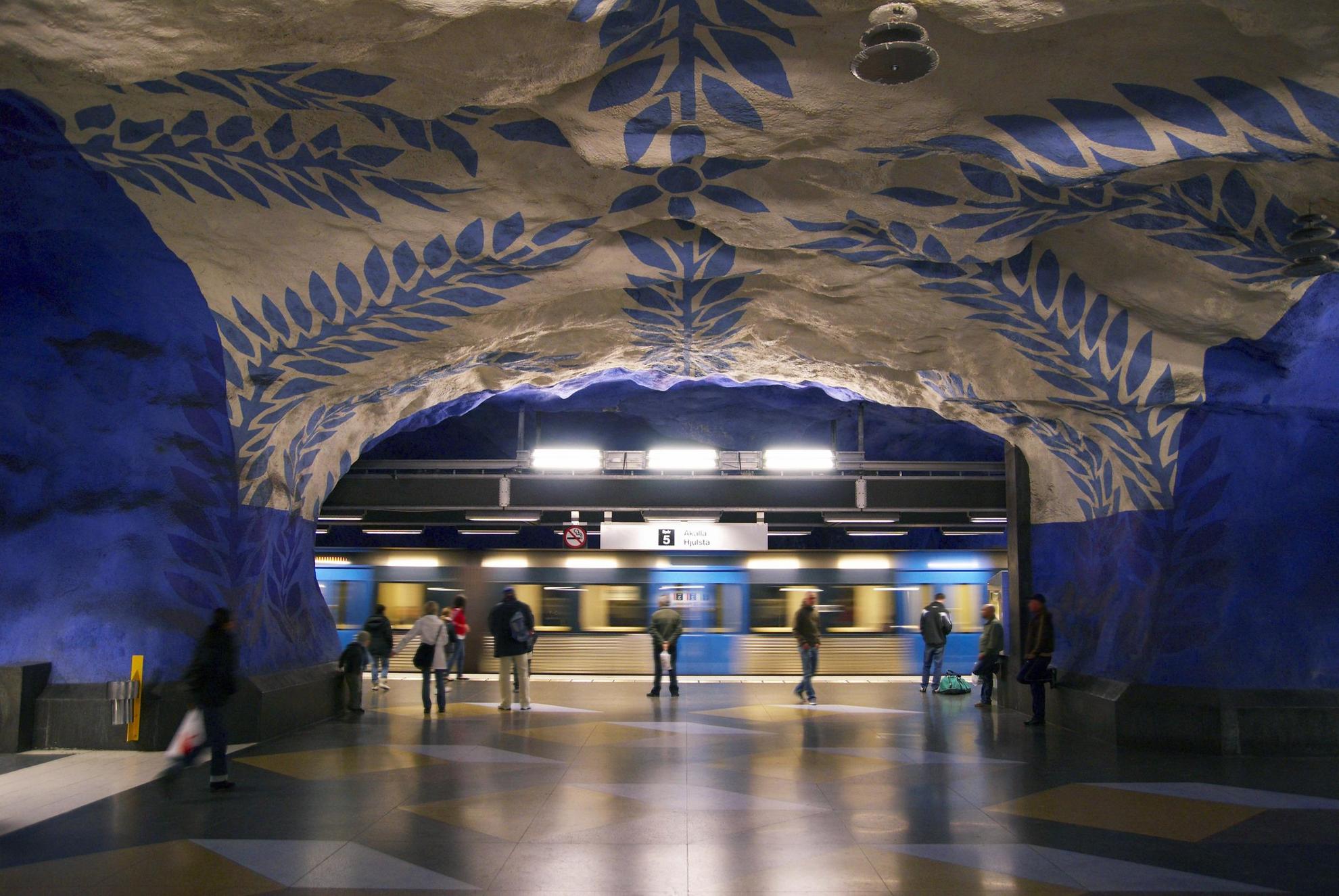 An artsy blue and white underground metro station in Stockholm.
