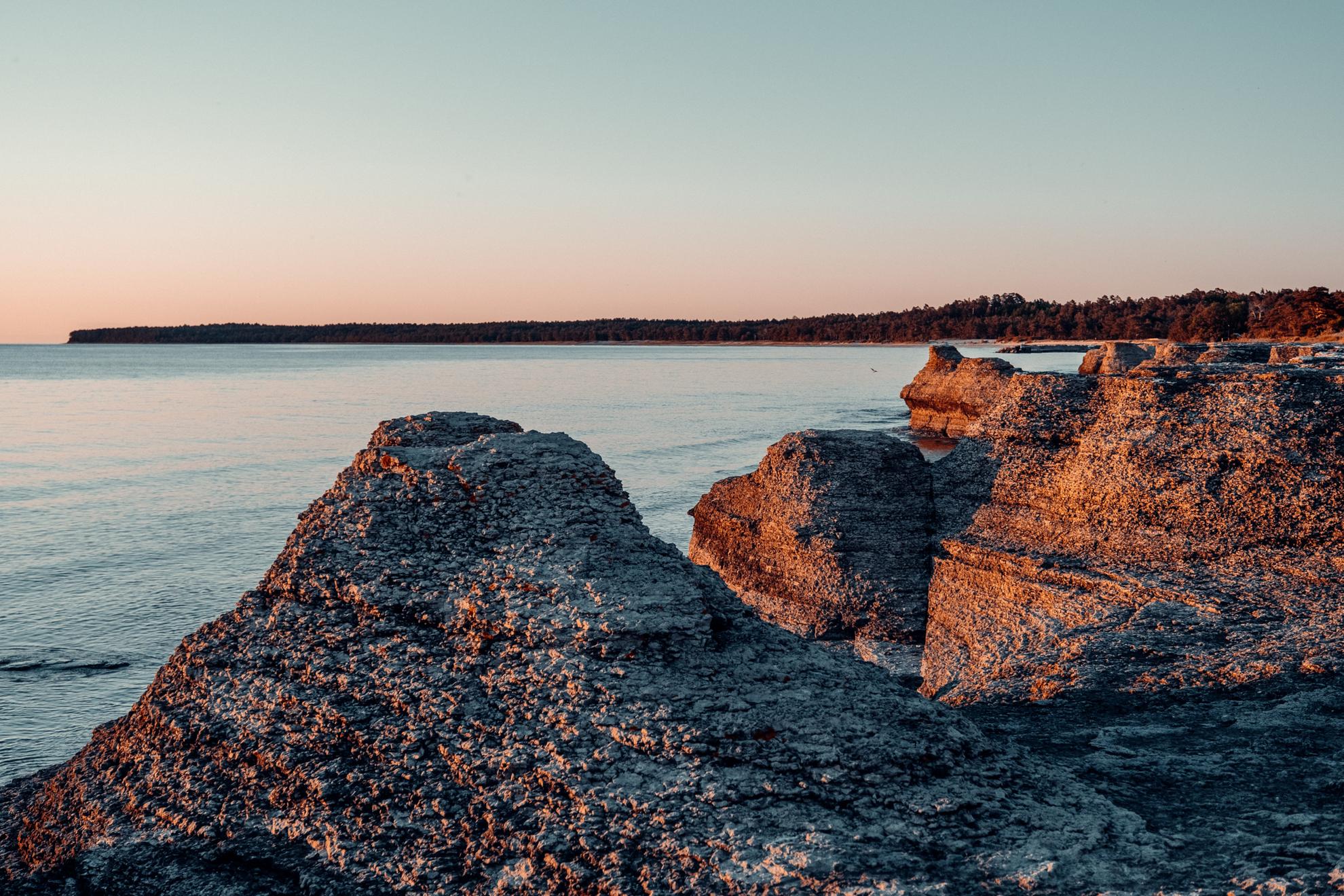 Sunset over rauk formations next to the sea on Öland